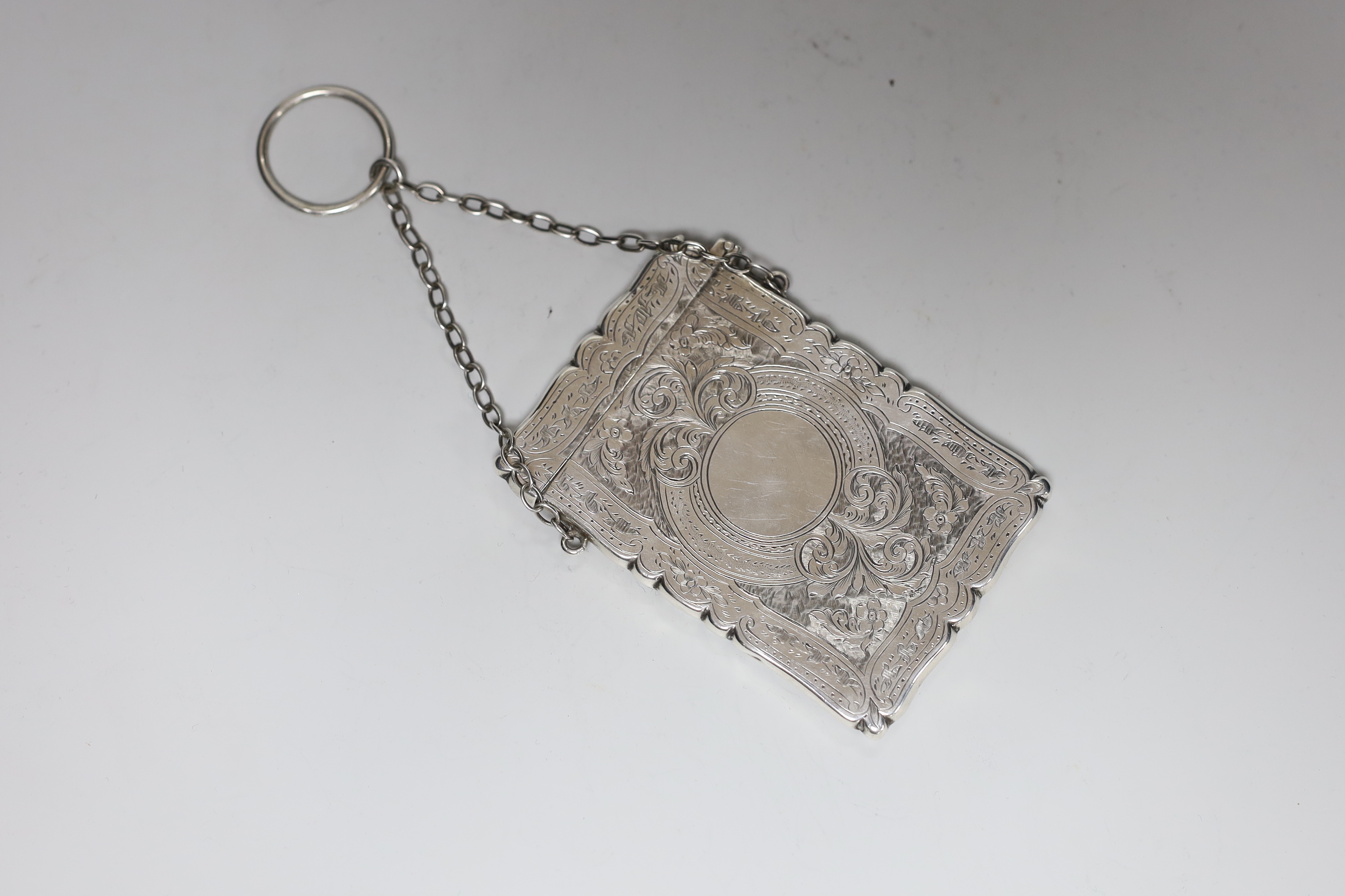 A late Victorian engraved silver card case, Saunders & Shepherd, London, 1895, 95mm.